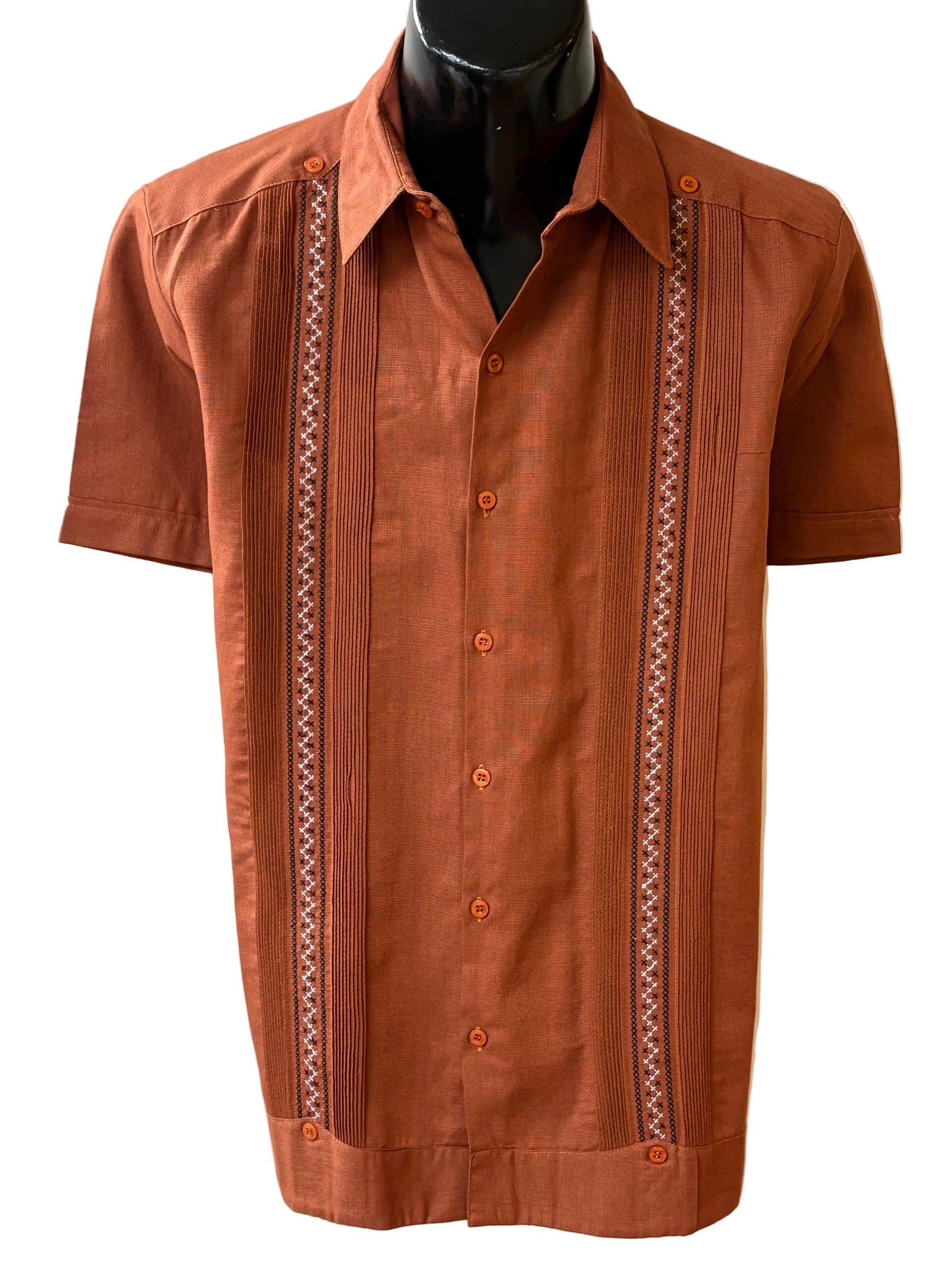 A new Penner's design that features a beautiful embroidery down the front of the shirt. These shirts are a poly/cotton blend making them easy to care for without having to iron. The square bottom makes it the perfect shirt to wear on the outside casually with shorts or dressed up with slacks or chinos. 