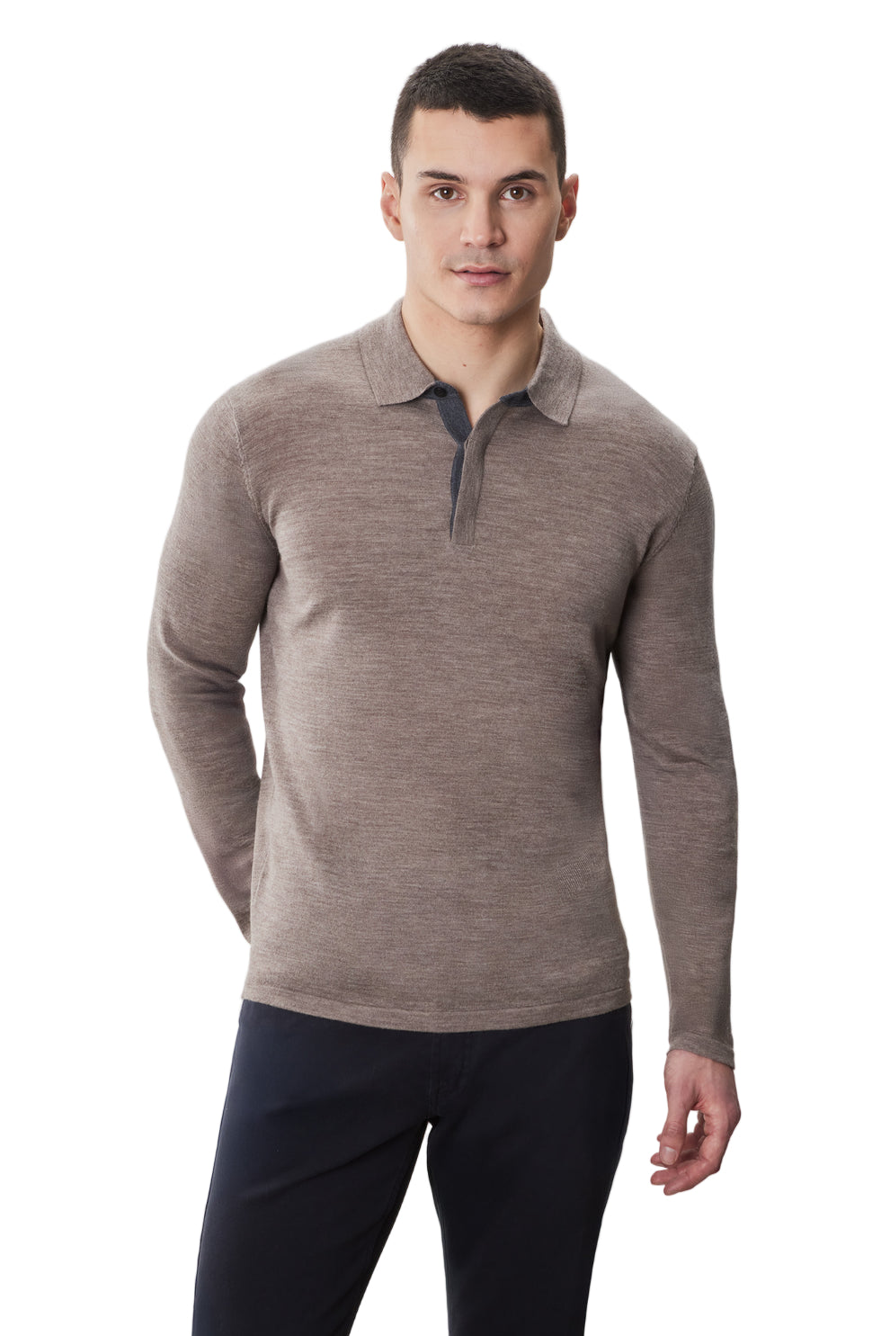 Crafted from luxurious Extra Fine Merino Wool, this long sleeve polo offers an elevated look with exceptional softness and breathability. Designed as the perfect layering piece under a jacket, it delivers refined comfort without bulk. Available in seven rich colors, it’s a versatile wardrobe staple for effortless, polished style year-round.