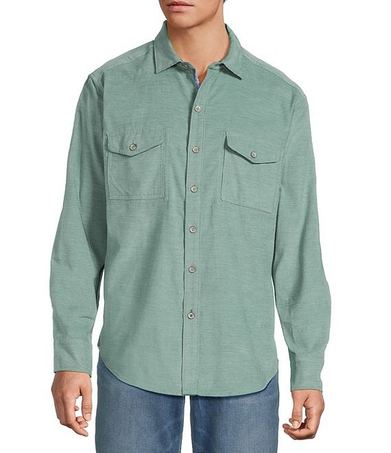From Tommy Bahama, this shirt features:


Solid heather tone
Spread collar
Long sleeves
Full button-front closure
Button-through flap pockets
Shirttail hem
Cotton
Machine wash/tumble dry