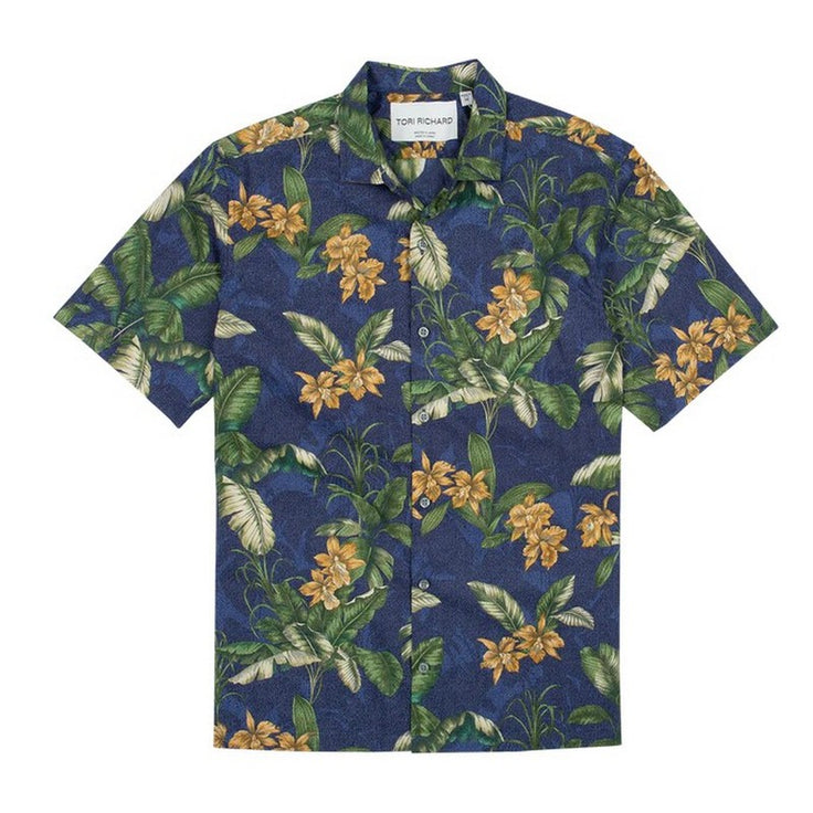 The cattleya orchid isn't native to Hawaii, but is sure seems to love it here. You'll find them in leis, flora arrangements, and many other mediums, offering an air of hospitality and welcome.

Printed in Japan, then hand-cut and sewn in Hawai‘i, this shirt is made from 100% cotton lawn, an ideal fabric for staying cool in warmer climates. It features signature screen-cutting techniques we’ve been perfecting for 60 years. A proprietary finish adds a subtle luster.

100% Cotton Lawn
Proprietary finish.
Made